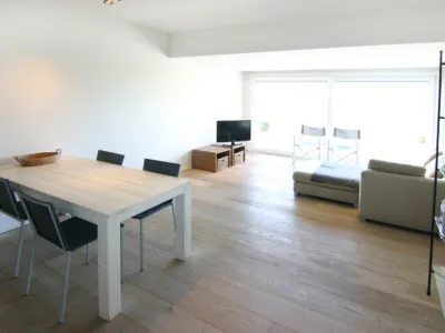 Sluuswachter 66 4 vakantieappartement in Cadzand met zeezicht eethoek